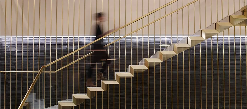 Suspended brass staircase